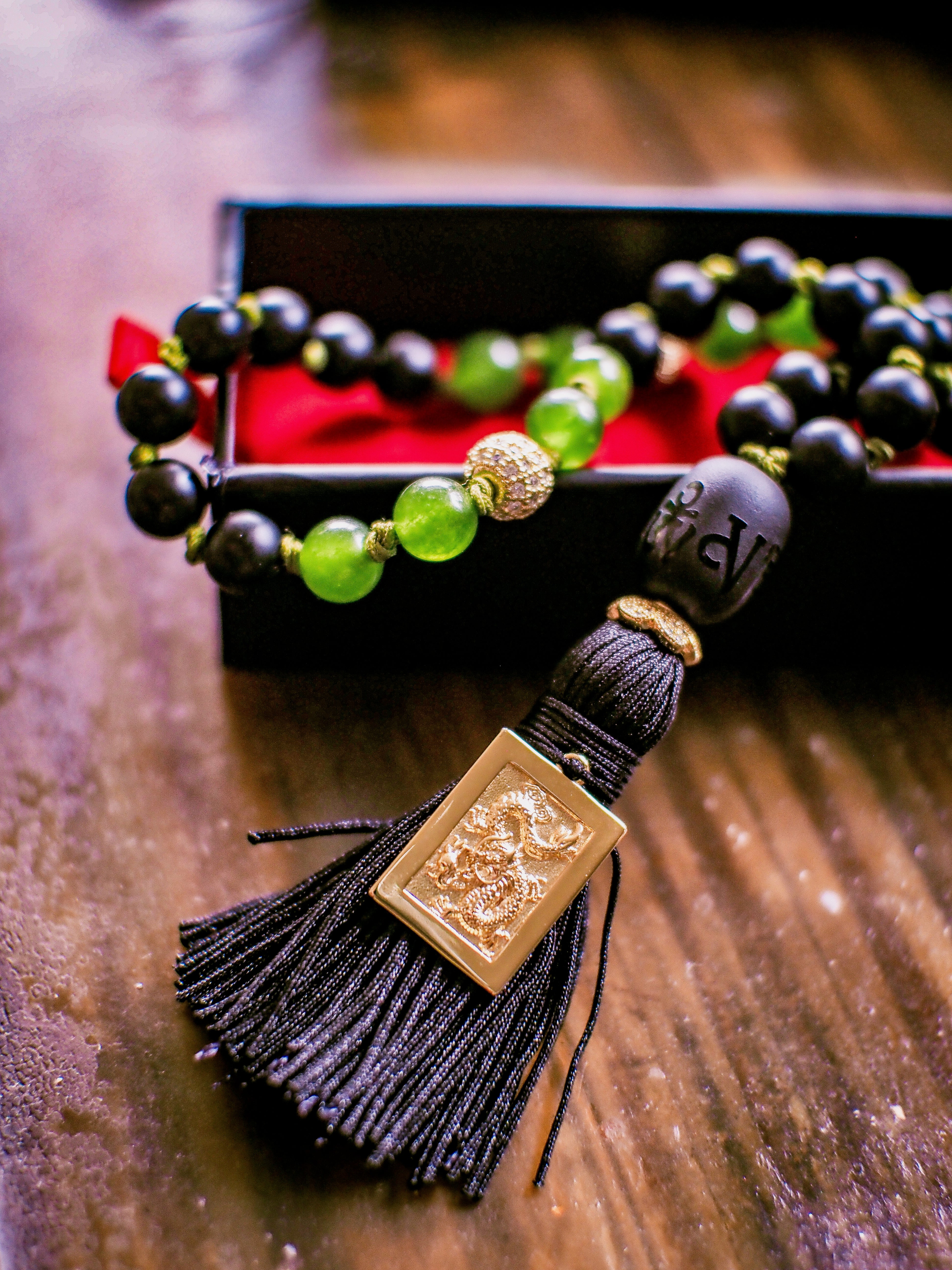 Staying Grounded Mala — black beads with jade and gold dragon tassel